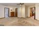Bright bedroom with a ceiling fan, wood trim and access to the kitchen and bathroom at 4920 Tremont Ne Dr, Marietta, GA 30066