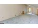 Large and unfurnished bonus room with high ceilings, a neutral wall color, and wood trimmed windows at 4920 Tremont Ne Dr, Marietta, GA 30066