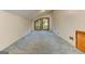 Unfurnished bonus room with high ceilings, neutral walls, and natural lighting at 4920 Tremont Ne Dr, Marietta, GA 30066