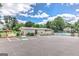Clubhouse featuring parking and a tennis court, adding to the recreational amenities at 4920 Tremont Ne Dr, Marietta, GA 30066