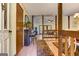 Inviting foyer with wood floors, exposed beams, and a view into the dining and living areas at 4920 Tremont Ne Dr, Marietta, GA 30066