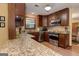 A kitchen with a view, showcasing granite countertops and stainless appliances in a cozy layout at 4920 Tremont Ne Dr, Marietta, GA 30066