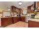 Traditional kitchen with warm wood cabinets, granite countertops, and stainless steel appliances at 4920 Tremont Ne Dr, Marietta, GA 30066