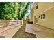 Backyard featuring a wooden fence, a stamped patio, and grass at 2821 Amhurst Nw Way, Kennesaw, GA 30144