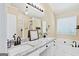Bright bathroom featuring double sinks, granite countertops, and a soaking tub at 2821 Amhurst Nw Way, Kennesaw, GA 30144