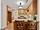 Kitchen with wooden cabinets, granite countertops, and stainless steel appliances at 2821 Amhurst Nw Way, Kennesaw, GA 30144
