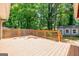 Expansive wooden back deck, perfect for relaxing and overlooking the lush backyard at 2985 Westbury Dr, Decatur, GA 30033