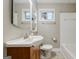 Bright bathroom with modern sink and vanity, combined tub and shower, and neutral color palette at 2985 Westbury Dr, Decatur, GA 30033