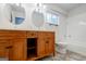 Bathroom featuring double sinks, granite counters, and a pristine white tiled shower at 2985 Westbury Dr, Decatur, GA 30033