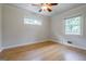 Clean, light-filled bedroom with hardwood floors and a ceiling fan at 2985 Westbury Dr, Decatur, GA 30033