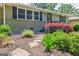 Up-close view of landscaped front yard with stone steps leading to the front door of the home at 2985 Westbury Dr, Decatur, GA 30033