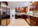 Modern kitchen featuring stainless steel appliances, granite countertops, and ample cabinet space at 2985 Westbury Dr, Decatur, GA 30033