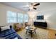 Cozy living room with a comfortable sofa, decorative rug, and abundant natural light at 2985 Westbury Dr, Decatur, GA 30033