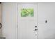 Close-up of a white door with glass window at 4020 Ester Sw Dr, Atlanta, GA 30331