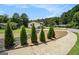 Charming home with a manicured front yard and beautiful landscaping, creating excellent curb appeal at 4020 Ester Sw Dr, Atlanta, GA 30331