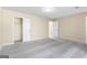 Bedroom with carpet, neutral walls, ceiling light, and closet with open doors at 9719 Dixon Industrial, Jonesboro, GA 30236