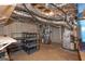 Unfinished basement with exposed ductwork and utilities, providing ample storage or renovation potential at 297 Collegiate Dr, Powder Springs, GA 30127