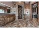 Spacious bathroom with double vanity, walk-in shower, and laundry area at 297 Collegiate Dr, Powder Springs, GA 30127