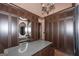 Organized walk-in closet with built-in storage cabinets and vanity at 297 Collegiate Dr, Powder Springs, GA 30127
