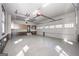 Spacious garage with high ceilings, ample storage, and room for multiple vehicles and projects at 297 Collegiate Dr, Powder Springs, GA 30127