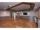 Neutral living room featuring recessed lighting, hardwood floors, and plenty of space to make it your own at 297 Collegiate Dr, Powder Springs, GA 30127
