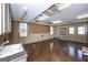 Functional utility room with a sink, storage shelves, and natural light, making chores a breeze at 297 Collegiate Dr, Powder Springs, GA 30127