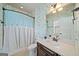 Cozy bathroom with a sink, toilet and shower/tub combo at 3015 Arbor Song Ct, Cumming, GA 30041