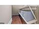 Storage area with hardwood floors and gray containers at 3015 Arbor Song Ct, Cumming, GA 30041