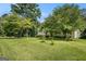 Beautiful front lawn of a single-story home on a sunny day at 2067 Skyhawk Ln, Acworth, GA 30102