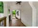 View of covered porch with brick arches, white brick columns, and decorative brick floor at 345 Adelle Se St, Atlanta, GA 30315