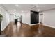 Open-concept living space featuring dark hardwood floors and contemporary design elements, perfect for entertaining at 345 Adelle Se St, Atlanta, GA 30315