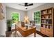 Charming office with bright windows, hardwood floors, ceiling fan, built-in bookcase, and stylish décor at 345 Adelle Se St, Atlanta, GA 30315