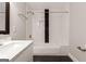 Updated bathroom with a shower and tub combination and updated fixtures at 870 Gaston Sw St, Atlanta, GA 30310