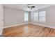 Sun-filled bedroom with hardwood floors and large windows at 870 Gaston Sw St, Atlanta, GA 30310