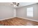 Bedroom with hardwood floors, a ceiling fan, and natural light at 870 Gaston Sw St, Atlanta, GA 30310