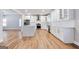 Modern kitchen with an island, stainless steel appliances, and bright white cabinets at 870 Gaston Sw St, Atlanta, GA 30310