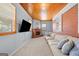Relaxing living room features a cozy fireplace, built-in shelving, and comfortable seating at 135 5Th Ave, Jonesboro, GA 30236