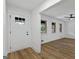 Bright living room showcasing wood floors, white walls, and windows providing natural light at 1400 North Avenue Nw, Atlanta, GA 30318