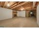 Unfinished basement with a decorative brick fireplace at 3180 S Elizabeth Dr, Douglasville, GA 30135