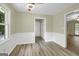 Cozy dining room with wood-look floors and natural light at 3180 S Elizabeth Dr, Douglasville, GA 30135