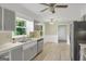 Bright kitchen with stainless appliances and gray cabinetry at 3180 S Elizabeth Dr, Douglasville, GA 30135