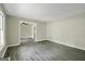 Inviting living area with gray flooring and neutral wall paint at 3180 S Elizabeth Dr, Douglasville, GA 30135