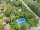 Community aerial view showcasing tennis courts, pool and lush landscape at 3506 Billingsley Dr, Marietta, GA 30062