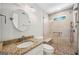 Bathroom featuring granite countertop, tiled shower with glass door and pebble floor at 3506 Billingsley Dr, Marietta, GA 30062