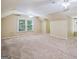 Large bonus room with carpet, multiple windows, and ceiling fans at 3506 Billingsley Dr, Marietta, GA 30062