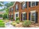 Charming two-story brick home with black shutters and manicured landscaping at 3506 Billingsley Dr, Marietta, GA 30062
