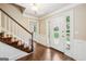 Inviting foyer with hardwood floors and a staircase, leading to a bright, open space at 3506 Billingsley Dr, Marietta, GA 30062