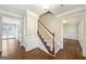 Welcoming foyer with hardwood floors and staircase leading to the second floor at 3506 Billingsley Dr, Marietta, GA 30062