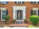 Elegant front door with decorative glass and sidelights, surrounded by brick facade at 3506 Billingsley Dr, Marietta, GA 30062