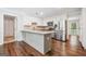 Bright kitchen featuring stainless steel appliances, granite countertops, and white cabinets at 3506 Billingsley Dr, Marietta, GA 30062